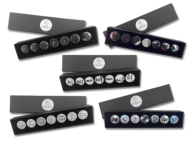Latest gift box additions with seven themed badges each.